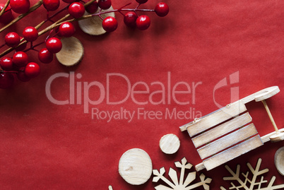 Christmas Decoration Like Sled On Red Wrapping Paper, Copy Space