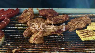 Closeup of pork on a BBQ grill