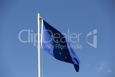 National flag of Alaska on a flagpole