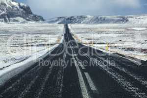 Wet and slippery road in Iceland, wintertime