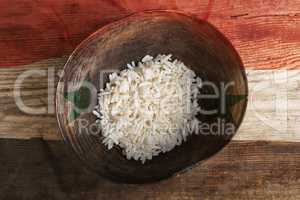 Poverty concept, bowl of rice with Syria flag