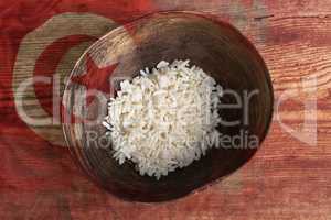 Poverty concept, bowl of rice with Tunisian flag