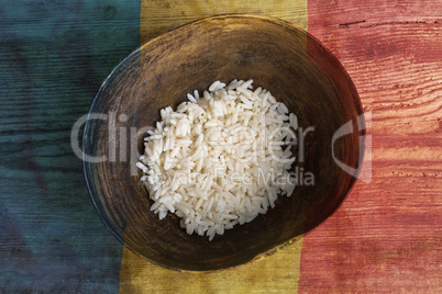 Poverty concept, bowl of rice with Romanian flag