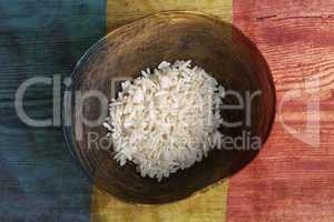 Poverty concept, bowl of rice with Romanian flag