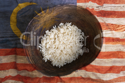 Poverty concept, bowl of rice with Malaysia flag