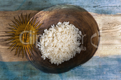 Poverty concept, bowl of rice with Argentine flag