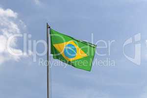 National flag of Brazil on a flagpole