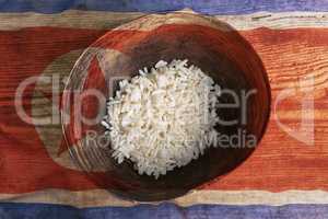 Poverty concept, bowl of rice with North Korea flag