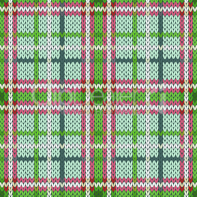 Seamless knitted pattern in green, red and white hues