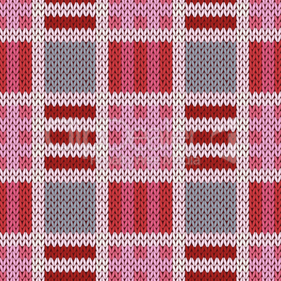 Knitting seamless pattern in red, pink and grey colors