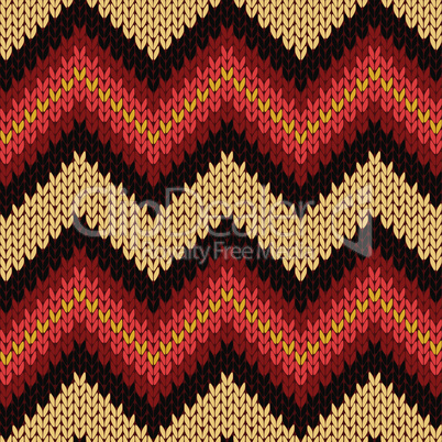 Knitting seamless zigzag pattern in warm colors