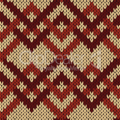 Knitting seamless zigzag pattern in beige and brown