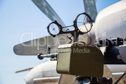 Retro gun on the tripod and optical sight