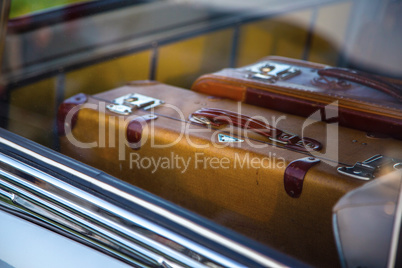 Retro suitcases in retro car