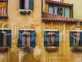 Vintage window of a house near the canal in Venice