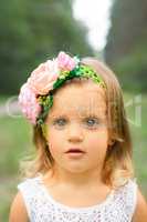 Portrait of a young girl on the nature