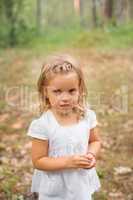 Portrait of a young girl on the nature