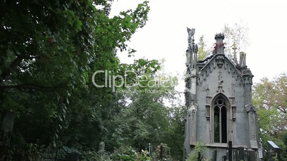 Gothic catholic family crypt in old cemetery