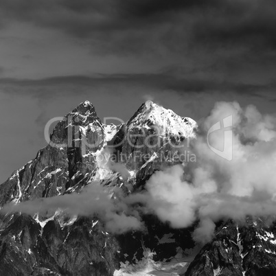 Black and white view on Mt. Ushba in clouds