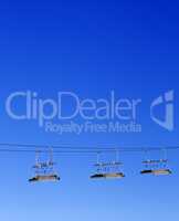 Ski-lift and blue clear sky