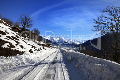 Snow road in winter morning mountain