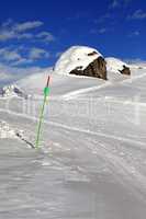 Ski slope in sun winter day