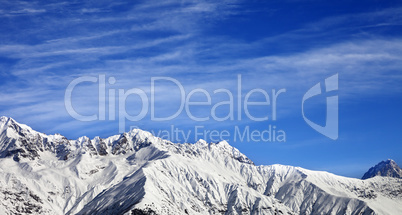 Panoramic view on winter mountains at sun winter day