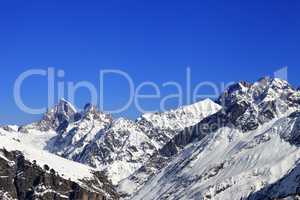 Winter mountain peaks at sunny day