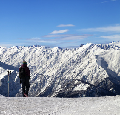 Women on ski slope in winter snow mountain at sun day