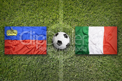 Liechtenstein vs. Italy flags on soccer field
