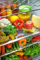 Open refrigerator filled with food