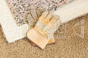 Gloves On Pulled Back Carpet and Pad In Room