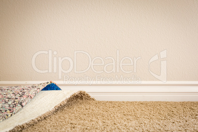 Pulled Back Carpet and Padding In Room