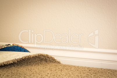 Pulled Back Carpet and Padding In Room