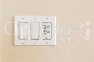 Light Switches and Fan Control on Wall