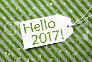 Label On Green Wrapping Paper With Snowflakes, Text Hello 2017