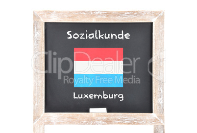 Sozialkunde mit Flagge auf Tafel