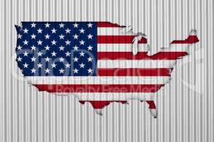 Karte und Fahne der USA auf Wellblech