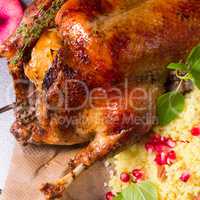 Duck with millet and pomegranate