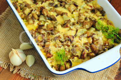 Baked potato with slices of eggplant cheese and garlic