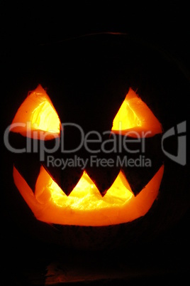 frightful ghost face glowing on Halloween