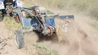 special equipment on a tractor for digging the potato