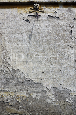 Sundial on the wall of Baroque chapel