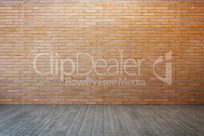 empty room with brick wall and wood floor