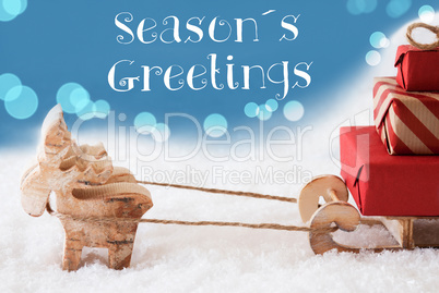 Reindeer, Sled, Light Blue Background, Text Seasons Greetings