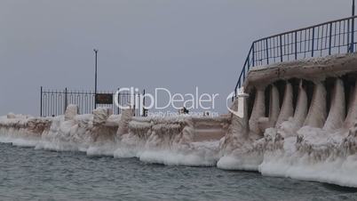 old pier in the winter after the storm