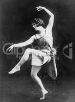 Portrait of female modern dancer performing