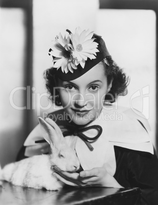 Portrait of woman with rabbit on Easter