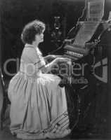 Portrait of woman playing organ