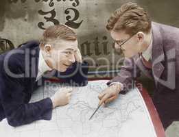 Excited businessmen meeting with map